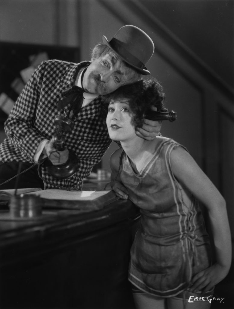 Donald Calthrop and Chili Bouchier in Shooting Stars (1928), telephone