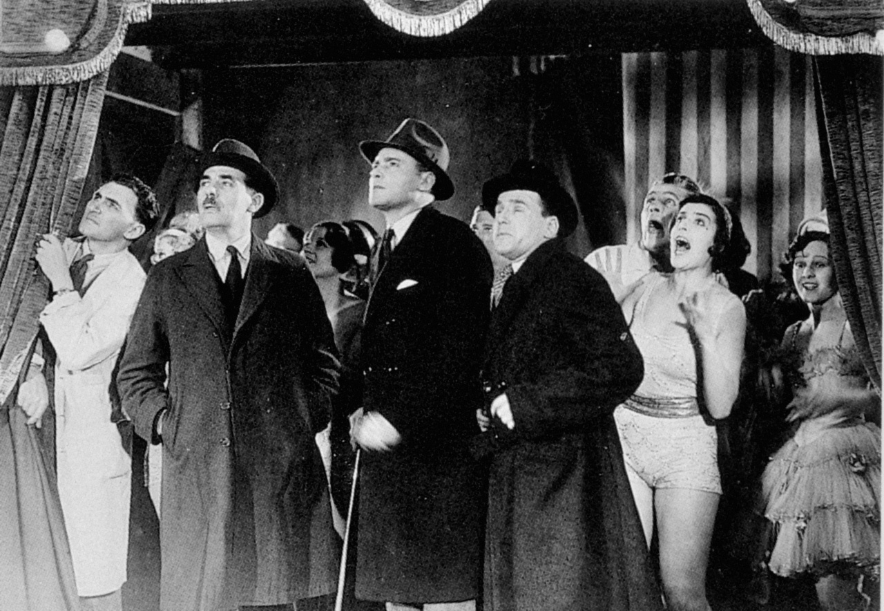 Herbert Marshall (centre, with cane) and Edward Chapman (with binoculars) in Murder! (1930, dir. Alfred Hitchcock)